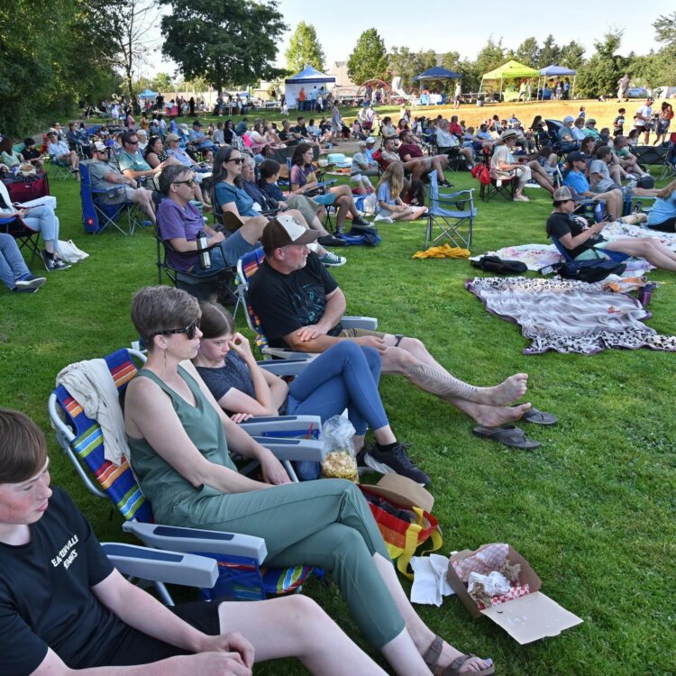 Crowd watching an outdoor performance of Tacoma Concert Band
